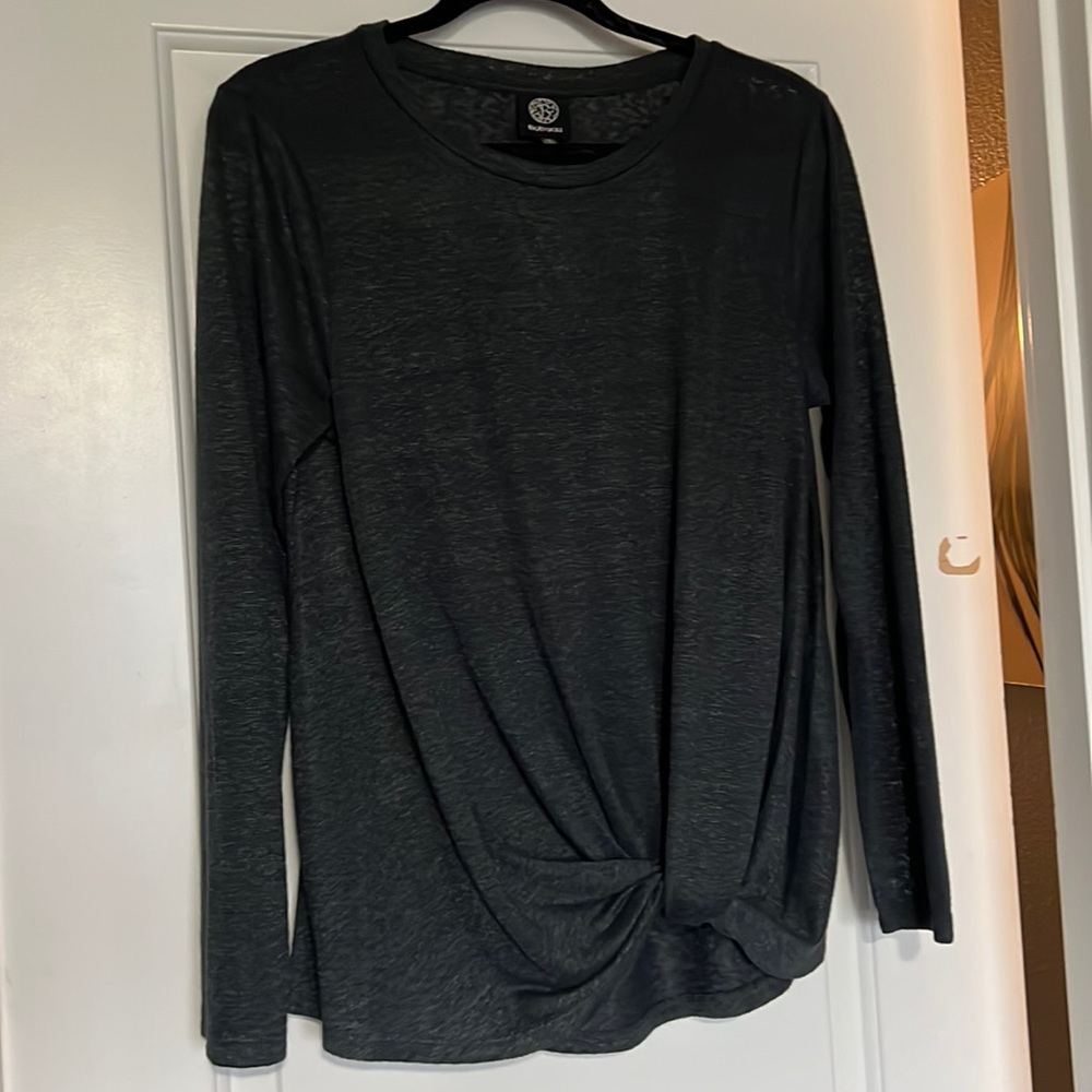 Light weight long sleeve top with knotted feature at waist